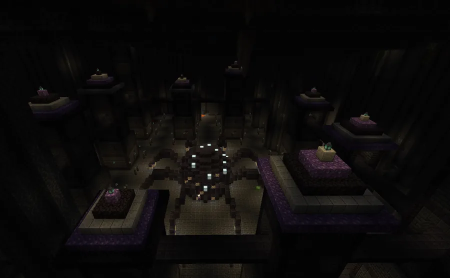A dark underground hall of pillars topped with lanterns, with a giant spider statue at its centre