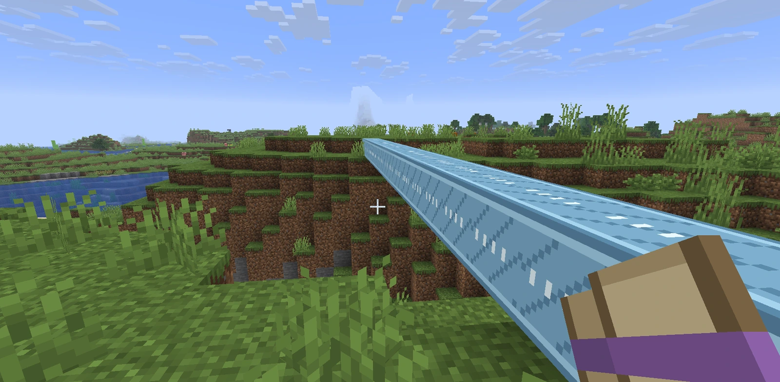 A pale blue conjured walkway extending straight out across a ravine toward the horizon