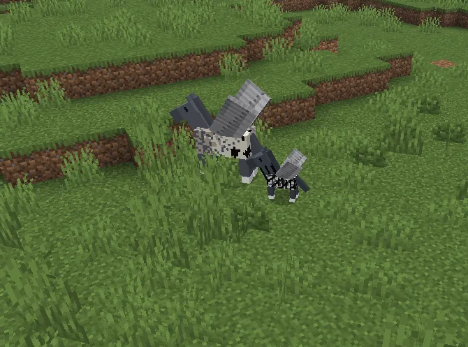 A grey winged pegasus and its foal standing in open grassland